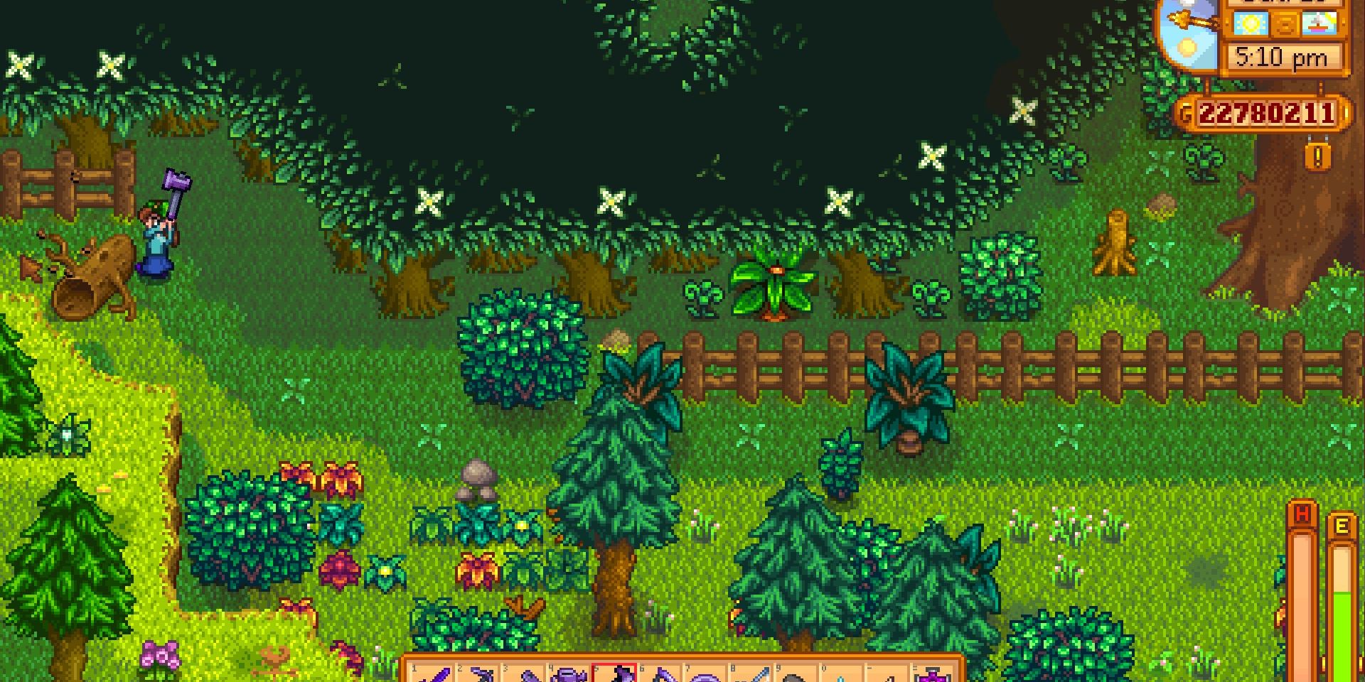 Image of the Iridium Axe being used to cut a big log in Stardew Valley.