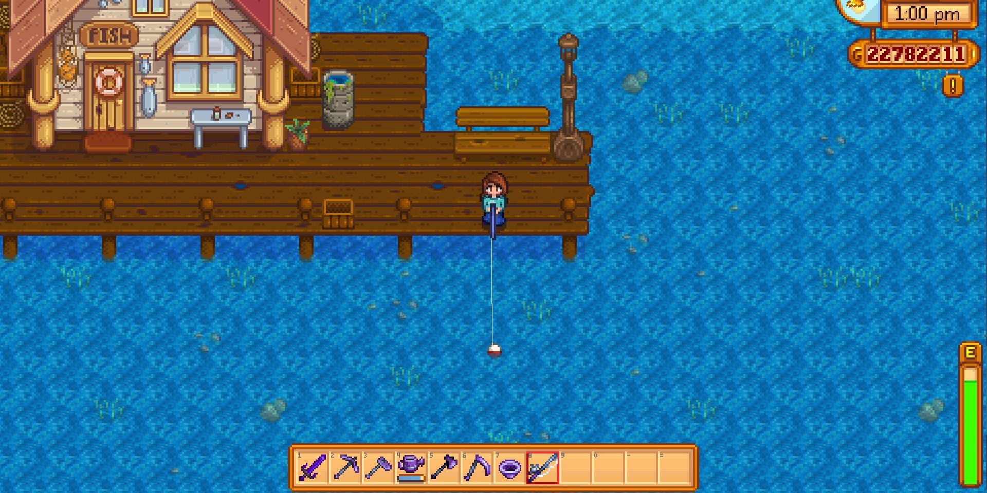 Image of the Iridium Fishing Rod being used on the Beach in Stardew Valley.